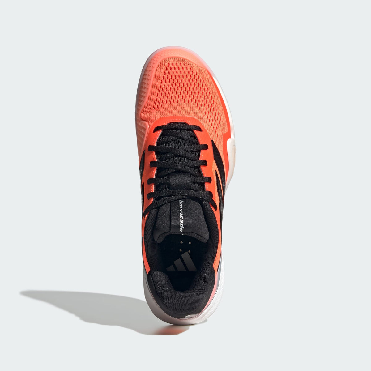 Vista lateral de adidas Barricade 14 naranjo